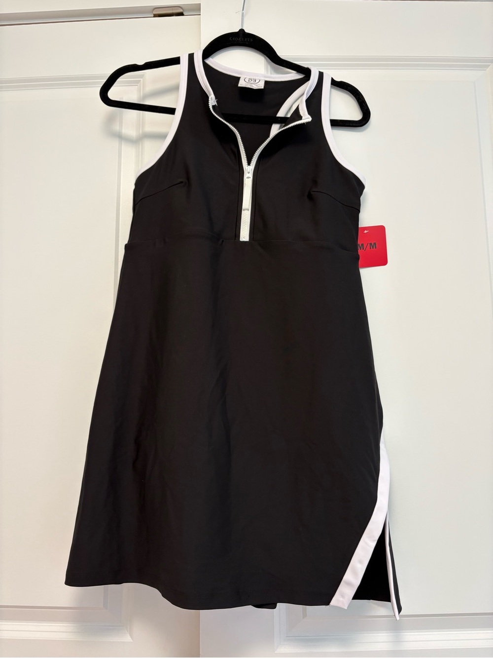 Sleeveless Black and White Zip-Front athletic dress